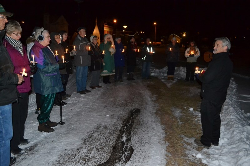 Pastor John Lentz addresses the crowd during the Hospice Tree Light-up ceremony.