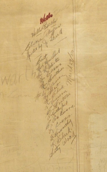 The signatures of the Elnora Players from 1950 on the back of the historic Penhold curtain. Frances Cuyler&#8217;s (nee Kenworthy) is third from the bottom.&lt;br