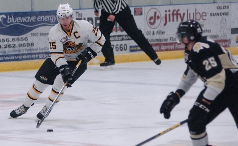 Jack Goranson skates through the neutral zone in Olds on Dec. 11. The Grizzlys beat the Bonnyville Pontiacs 5-4 in a shootout.