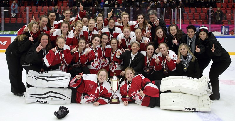 Members of Canada&#8217;s gold-medal-winning ringette team &#8212; including head coach and former Olds resident Lorrie Horne &#8212; pose for a photo after winning the