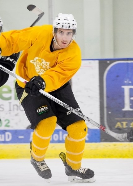 Olds Grizzlys player James Miller runs through a drill during a team practice on Jan. 18. Miller is one of three Grizzlys prospects chosen to play for Team West at the CJHL
