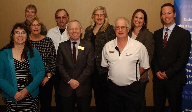 Members of the Olds and District Chamber of Commerce gather at the chamber&#8217;s annual general meeting at the Pomeroy Inn &#038; Suites March 9. From left (front row):