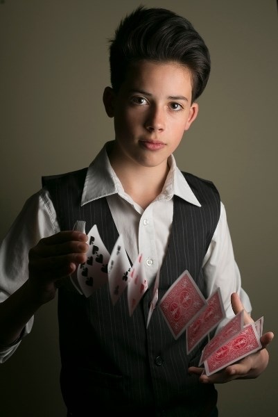 Magician Pablo Becker shows off his &#8220;cardistry&#8221; in Olds.