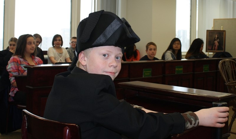 Grade 6 student Adam Jorgenson in his role as the Sergeant-at-Arms in the mock legislature.
