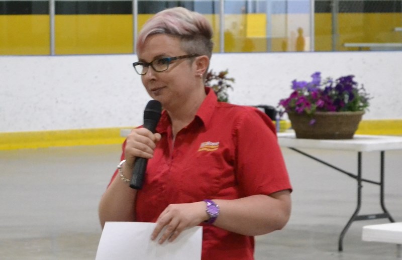 During the Communities in Bloom kickoff, B &#038; M Home Hardware manager Tasha Bieber announces the fact the store will be selling a new tulip to celebrate Canada&#8217;s