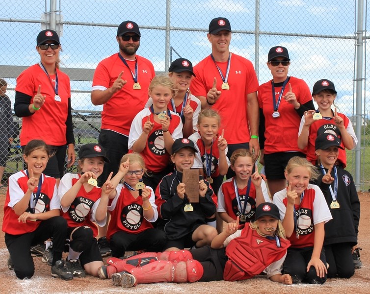 The U-10A Pistols after winning the Softball Alberta provincial championship earlier this month. They defeated St. Albert 11-5 in the final game. From left to right: coaches