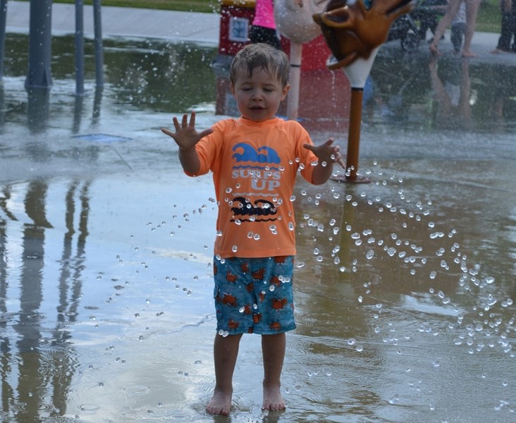 The water droplets were just a little too much for Michael Atkinson, 3, as he played in the Splash Park on Aug. 4.