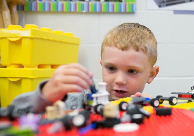 LORD OF LEGO &#8211; School officially starts up again this Thursday, Sept. 1. Here, Liam Cavin plays with Lego during an open session for current and upcoming students at