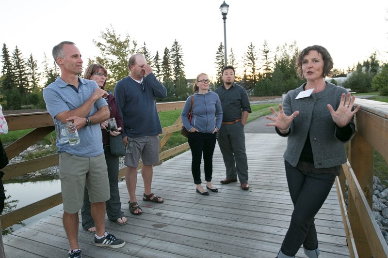 Guests take a tour of the wetlands from Jane Reksten, manager of the Botanic Gardens, Treatment Wetlands and Greenhouses.