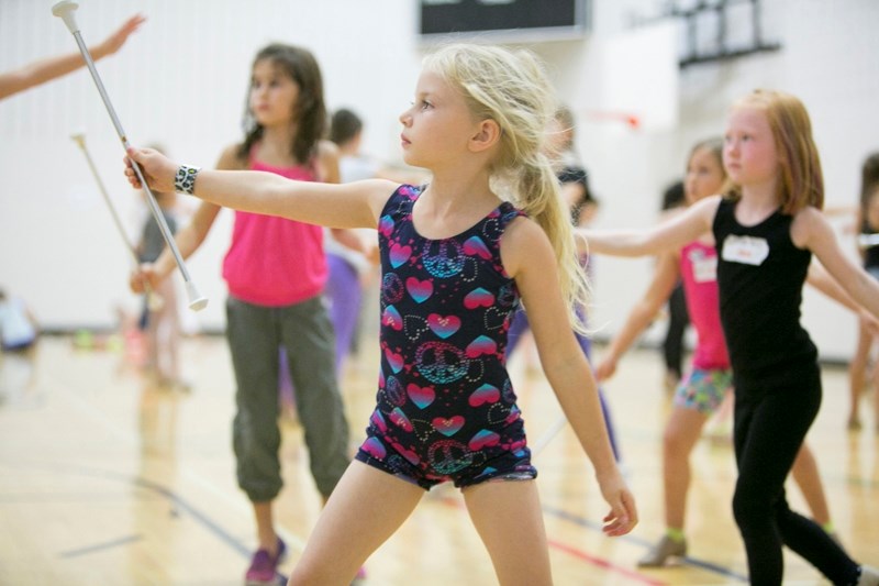 Cory Henning works on a routine with other students during the Alberta Baton Twirling Association&#8217;s fall training camp at Holy Trinity Catholic School on Oct. 1. This