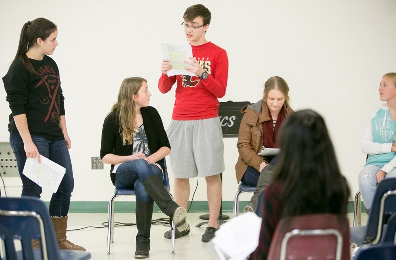 From left, students Kayla Jansen, Kyla Bosomworth, Sage Jackson, Ashley Johnson and Karis Stirling rehearse Nov. 2 for Olds Koinonia Christian School&#8217;s upcoming