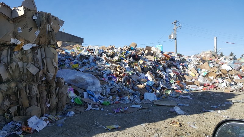 Lisa White says piles of recycling at the Olds Waste Transfer Station such as this one prevent her from dropping off shredded paper at facility bays.