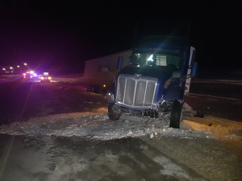The crash scene on the Queen Elizabeth II Highway near Bowden in the early morning hours of Dec. 29 that resulted in the deaths of two Calgarians, one a Good Samaritan who