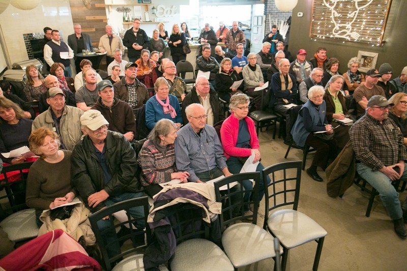 The audience in a packed Grouchy Event Centre listens to candidates speak during the Olds-Didsbury-Three Hills Progressive Conservative constituency association&#8217;s