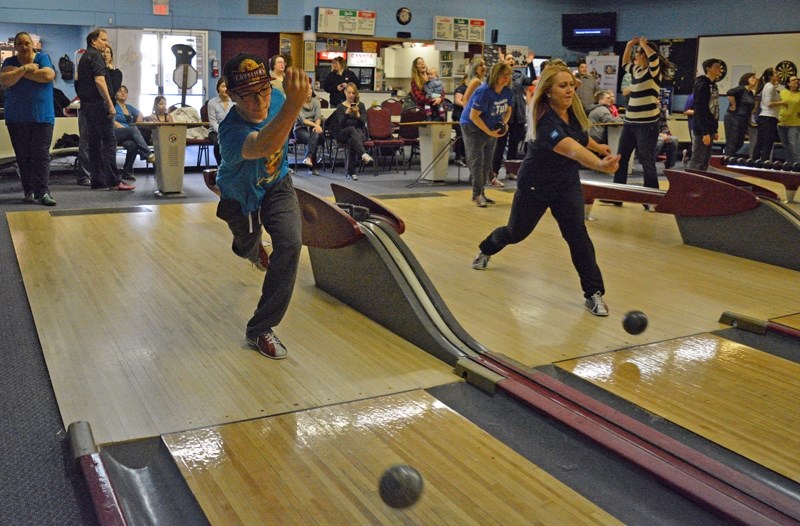 Action at last year&#8217;s Bowl For Kids fundraiser. About $40,000 was raised for Big Brothers Big Sisters Prairies to Peaks. The agency has set a goal of $100,000 for this