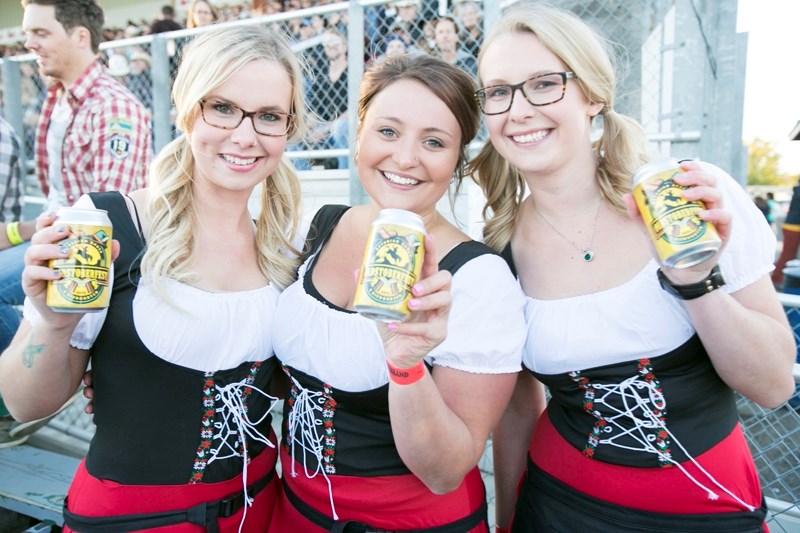 From left servers Maddie Kimmel, Sarah Reaman and Dayle Kimmel with Oldstoberfest beer during the first ever edition of the event in 2015.