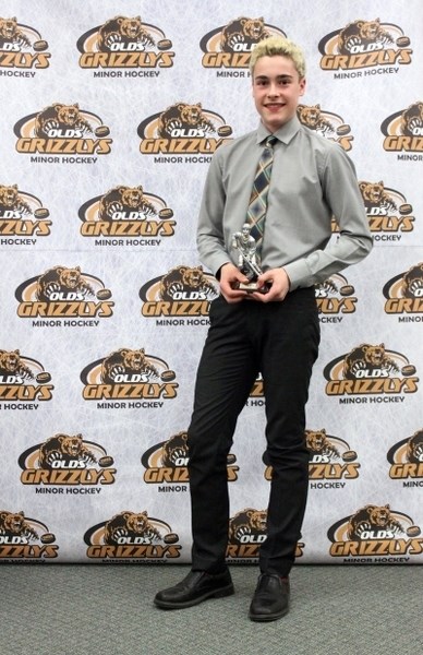 Peewee AA player Avery Trotter was presented with the OMHA&#8217;s Tammy Moritz 110% Award during the semi-annual meeting at the Olds College campus. Trotter also earned the