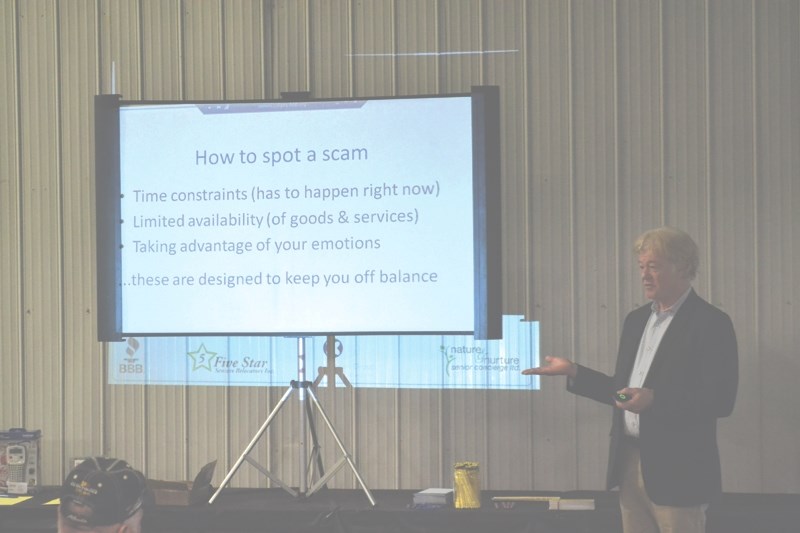 David McKee, the community outreach coordinator for the BBB of Southern Alberta and East Kootenay, outlines key components of scams during a presentation to the Zone 2 Rural