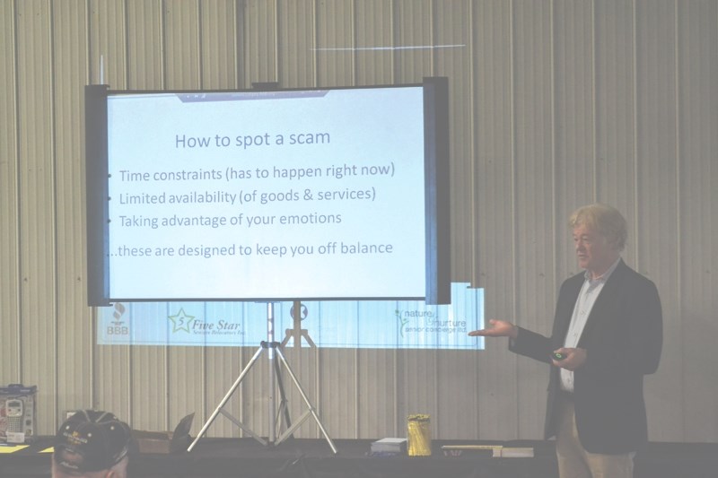 David McKee, the community outreach coordinator for the BBB of Southern Alberta and East Kootenay, outlines key components of scams during a presentation to the Zone 2 Rural