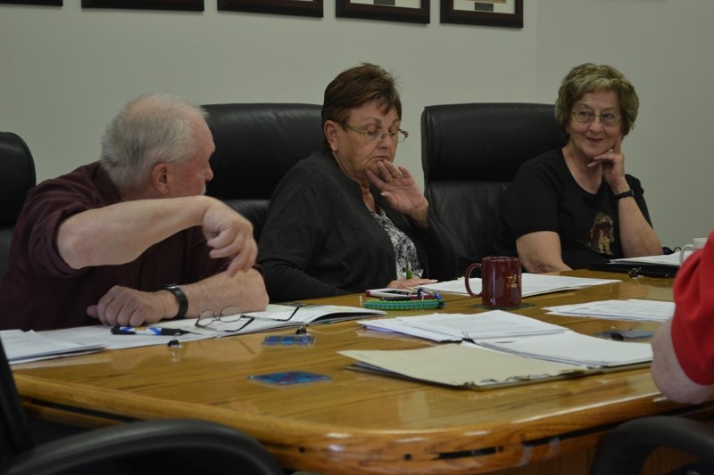 Coun. Wayne Milaney (far left) extols the virtues of the Bowden Rest Stop as fellow councillors Sandy Gamble (centre) and Sheila Church look on.