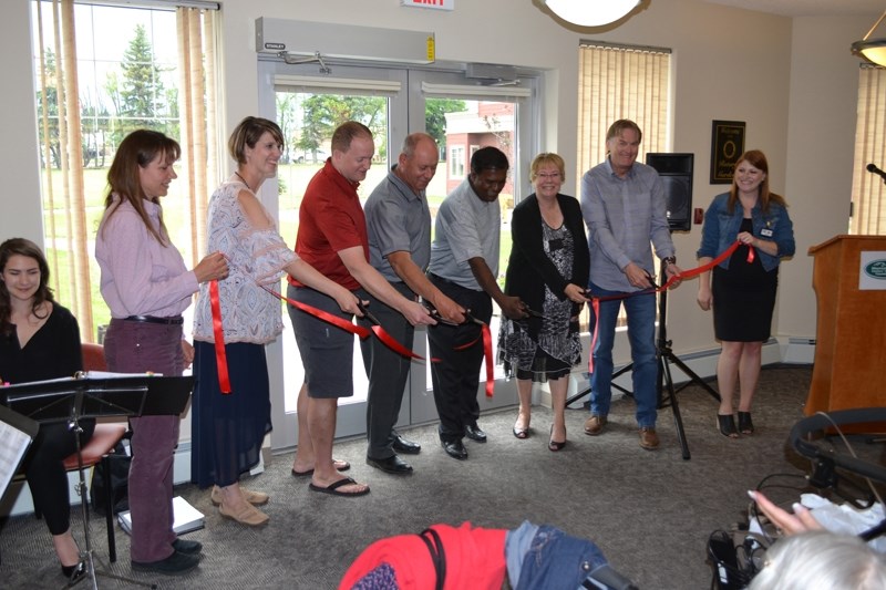 Staff and dignitaries cut the ribbon to officially open Rotary Gardens. From left: Mountain View Seniors&#8217; Housing (MVSH) chief financial officer Debra Steiger, MVSH