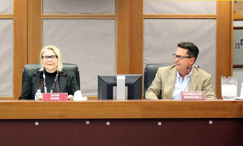 Coun. Wade Bearchell, right, looks on as Mayor Judy Dahl opens a regular council meeting. Bearchell confirmed last week that he won&#8217;t be running for mayor in the