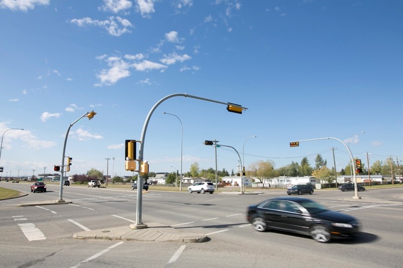 Vehicles travel through the intersection of 57 Avenue and 46 Street on Sept. 16.