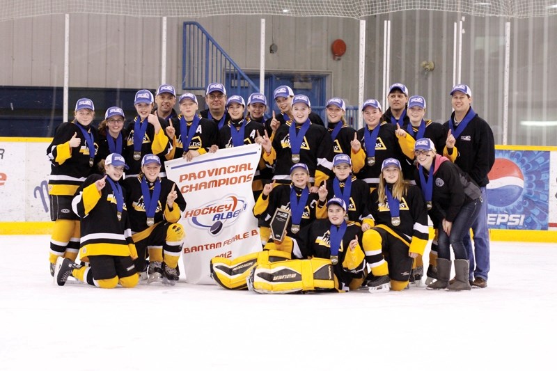 The Olds Female Bantam Renegades claimed the provincial championship two weekends ago. Last weekend, they also won the Rocky Mountain Hockey League title.