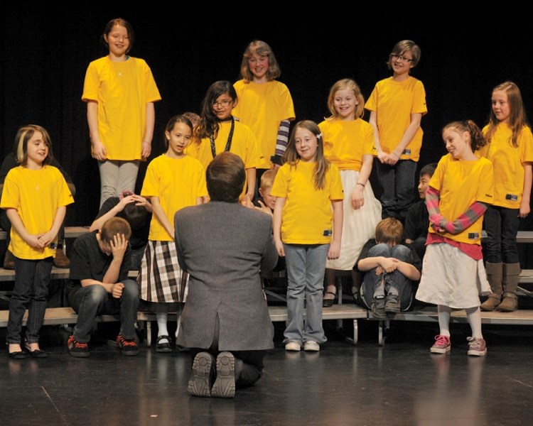 Larry Steed&#8217;s éOES Grade 4 Choral Speech group performs The Embarassing Episode of Little Miss Muffet during the 29th Annual Olds and District Kiwanis Music Festival