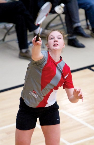 Jenna Koller of Edmonton competes in a doubles match at the Alberta Junior Provincials badminton tournament held at the Ralph Kleein Centre last Saturday.