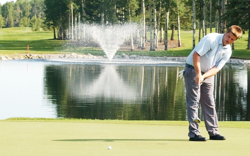 Jason Thiels putts on the third hole during the final round of the Alberta Men&#8217;s Amateur Championship on July 19.