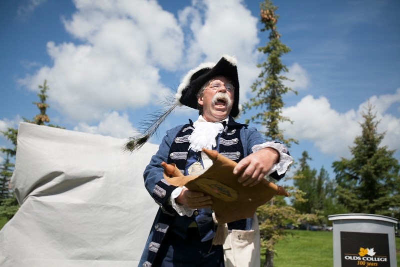 Town crier Denis Patry makes an announcement during the Oldstice celebrations on June 22. He is attending the World Invitational Town Crier Championships from August 1 to 5.