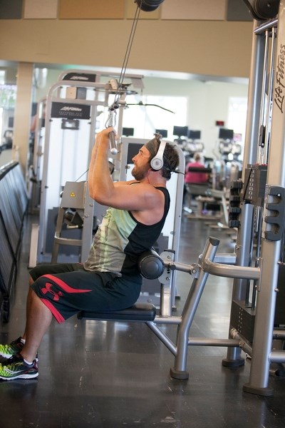 Zach Wray of Olds works out at the Community Learning Campus fitness centre on Aug. 1. The centre&#8217;s membership fees are going up on Sept. 1.