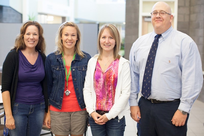 From left: New staff Libby Clark, Jana Kemmere, Melanie Hillier and Kent Lorenz are eager to join fellow staff and students at Olds High School as a new school year begins.