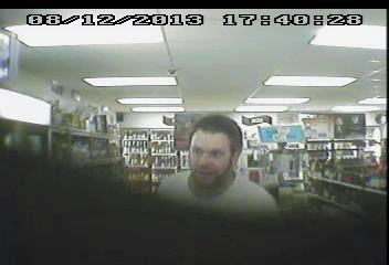 One of two men captured on video surveillance at the Bowden Liquor Store. Police said the men stole nearly $2,400 worth of liquor on Aug. 12.