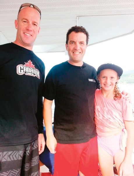 Canadian comedian and CBC personality Rick Mercer (middle) poses with Jason Clouston and his daughter Kallie duing a trip to B.C. on Sept. 7. The pair of Olds residents were