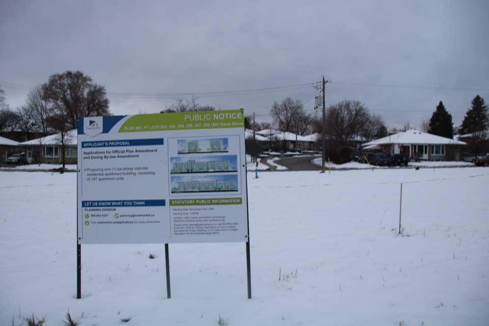 The vacant lot at 201 Davis Dr. with a development notice erected. Alan S. Hale/NewmarketToday 