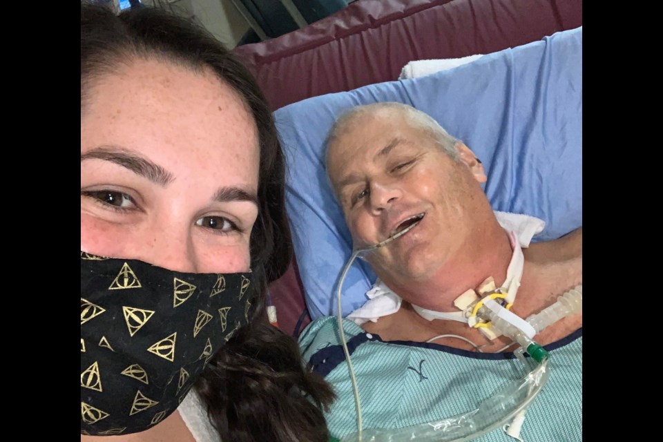 Brittany Dunlop with her father, Bobby, in hospital.