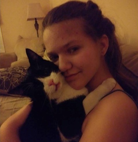 Rosie Hill, 12, and her service cat, Anakin, are shown here on the night of their reunion Jan. 16. Supplied photo