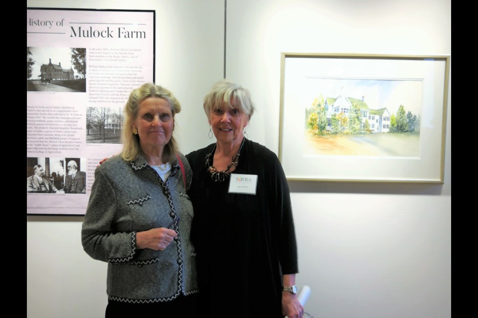 Shown at a reception marking the exhibit opening are Deborah Mulock Barbour (left), great great granddaughter of Sir William Mulock, and Linda Welch, president of the Society of York Region Artists. Supplied photo/Town of Newmarket