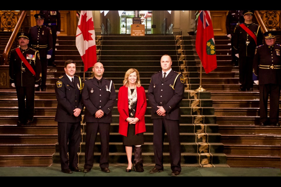Paramedics Bret Foisy and Richard Morra of York Region Paramedic Services have received the Ontario Award for Paramedic Bravery at Queen's Park from Deputy Premier Christine Elliott Oct. 22. Supplied photo/Christian Hasse for the Ontario government