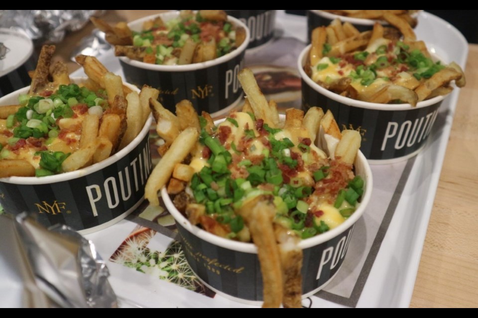 New York Fries sampling was a Bacone Double Cheese Poutine for PoutineFest last night at Market & Co. in Newmarket. Natasha Philpott for NewmarketToday