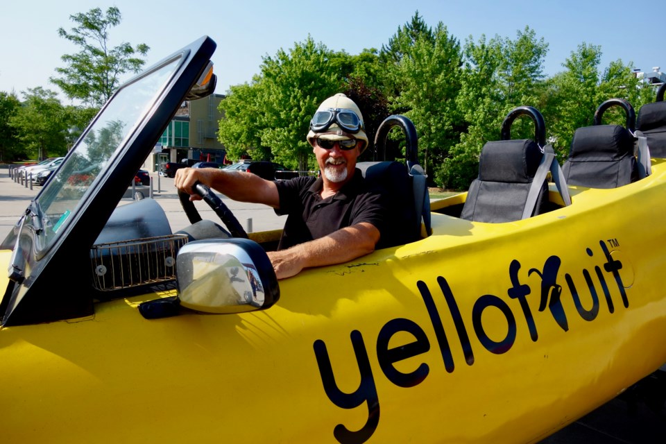 Steve Braithwaite — also known as Magnificent Steve when he dons his safari hat — is the man behind the Yellofruit Big Banana Car. Debora Kelly/NewmarketToday                               