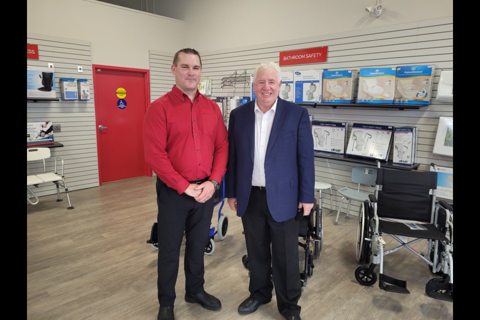 Geoff Patton, with his father-in-law and co-owner Kelly Parker, at the newly opened Homestead in Newmarket. 