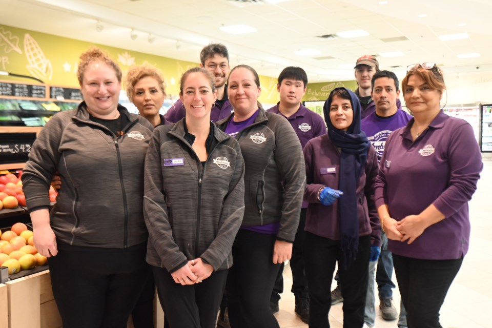 The staff of the new Amrbosia Natural Foods location in Newmarket gather in the new location. From left, Gillian Behrman, Rose Salehi, Laura Flynn, Dan Cariou, Michelle Victor, Ryan Wong, Zohreh Mohammadi, Kyle Reed, Kevin Sonoda, Nahid Rah 
