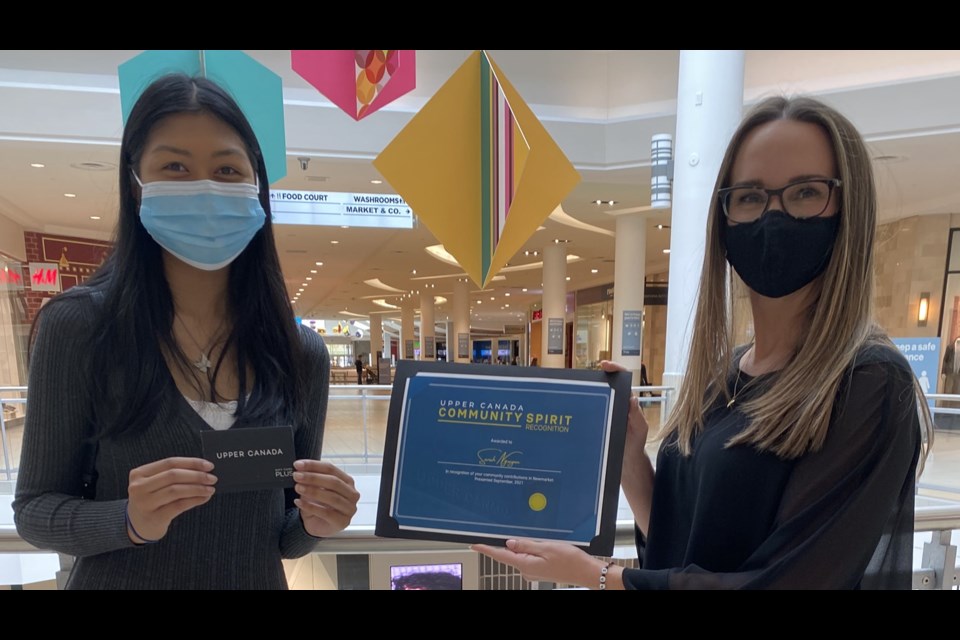 Christine Seidman (right) with the first winner of the Community Spirit Recognition, Sarah Nguyen, who advocated for better lighting on local pathways. 