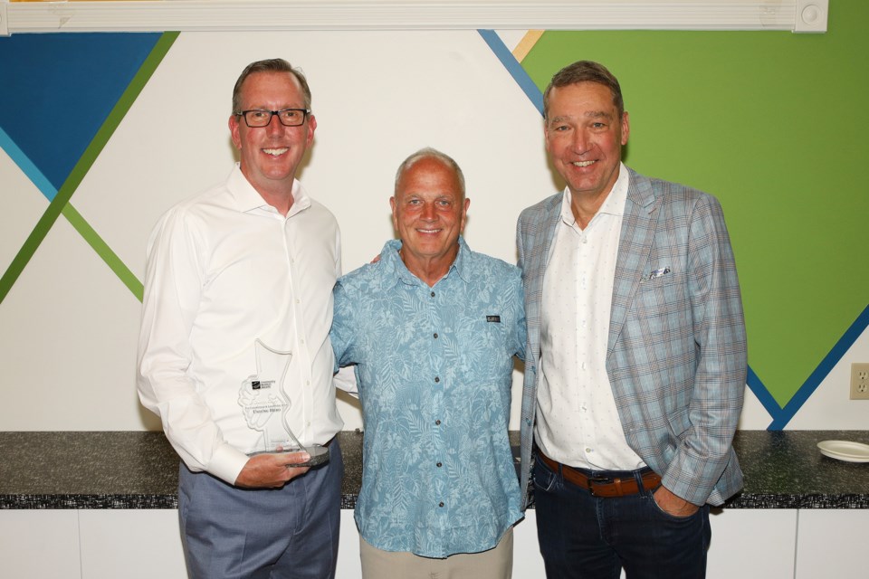 Darryl Gray, Dave Starr, and Mayor John Taylor.