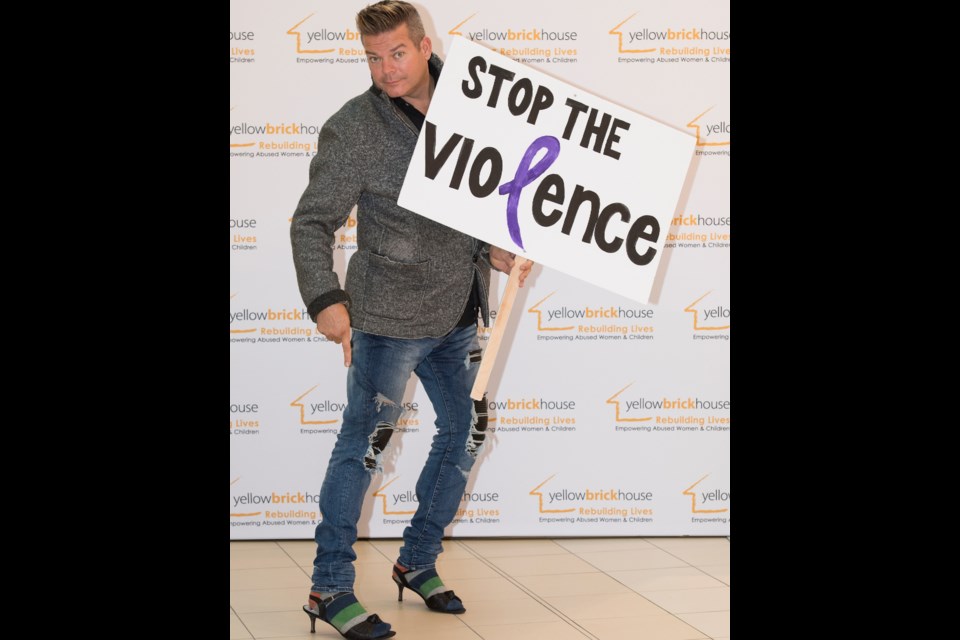 Walk a Mile in her Shoes event MC 105.9 TheRegion personality Rob Pagetto dons his heels to send a message of support. Supplied photo/Yellow Brick House