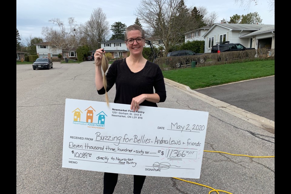 Newmarket resident Andrea (Bubba) Lewis cut her long locks for local charities and raised more than $11,600 for local food banks. Supplied photo