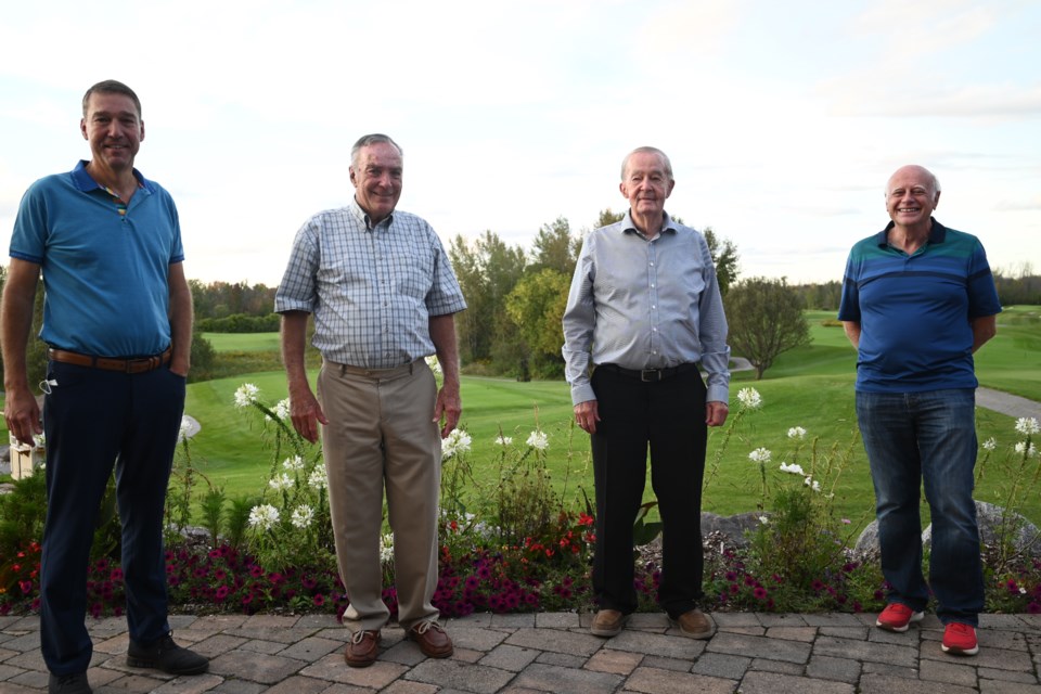 Newmarket's last four mayors gather to recognize the 25th anniversary of the Newmarket Mayor’s Charity Golf Classic Sept. 15 at Cardinal Golf Club:  current Mayor John Taylor (from left), John Cole, Tom Taylor, Ton Van Bynen. 